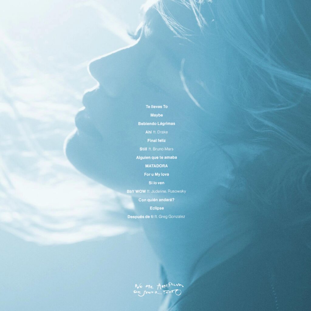 Blue abstract background with a vertical column of white handwritten Spanish lyrics running down the center.