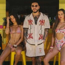 Ryan Castro posing in pieces from the AWAA capsule collection with Agua Bendita