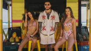 Ryan Castro posing in pieces from the AWAA capsule collection with Agua Bendita