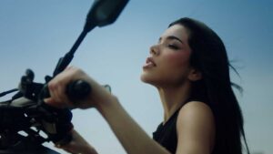 Kenia OS promoting her album K de Karma during the sold-out listening event in CDMX