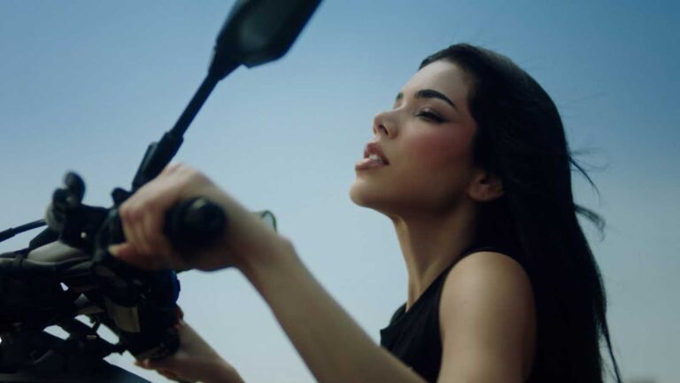 Kenia OS promoting her album K de Karma during the sold-out listening event in CDMX