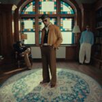 Rvssian, Rauw Alejandro, and Wizkid featured in promotional artwork for the single “Pongo”