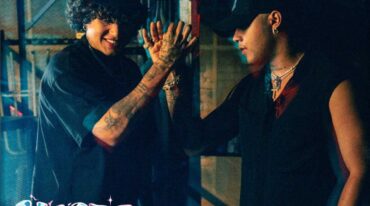 Two people in dark clothing high-five in a moody backstage scene, pink 'Hasta Abajo' text in the bottom left and 'Boza x Beéle' in the top right.