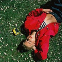 Annasofia in red jacket for her “Bulla” cover