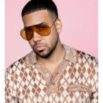 Romeo Santos portrait highlighting his role as a songwriter