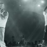 Ryan Castro performing in crowd at Coachella 2026 with water pit stage