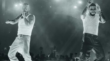 Ryan Castro performing in crowd at Coachella 2026 with water pit stage