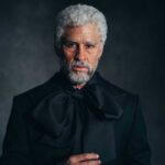 Bad Bunny wears prosthetic aging makeup and a black suit at the 2026 Met Gala.