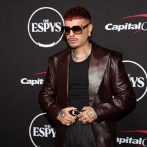 Rauw Alejandro posing on the red carpet at the 2026 ESPY Awards.