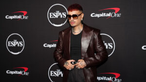 Rauw Alejandro posing on the red carpet at the 2026 ESPY Awards.