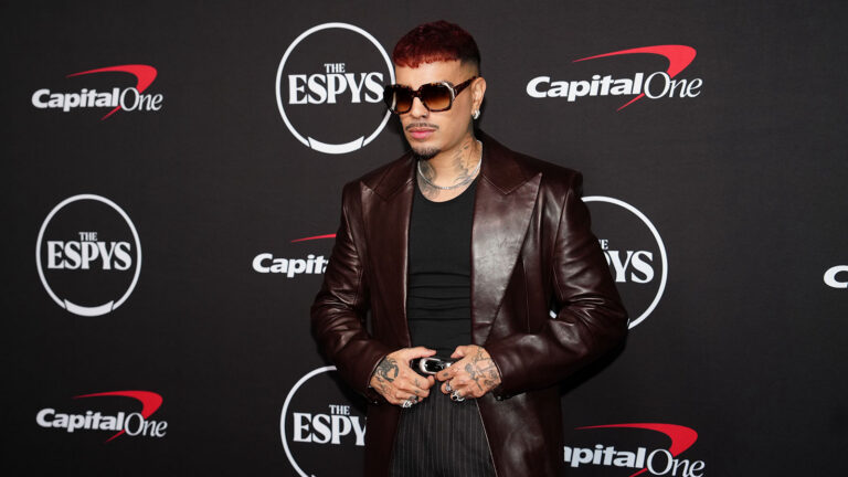 Rauw Alejandro posing on the red carpet at the 2026 ESPY Awards.